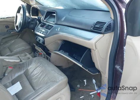 2010 Honda Odyssey Touring z USA, uszkodzony, nr VIN 5FNRL3H95AB042766